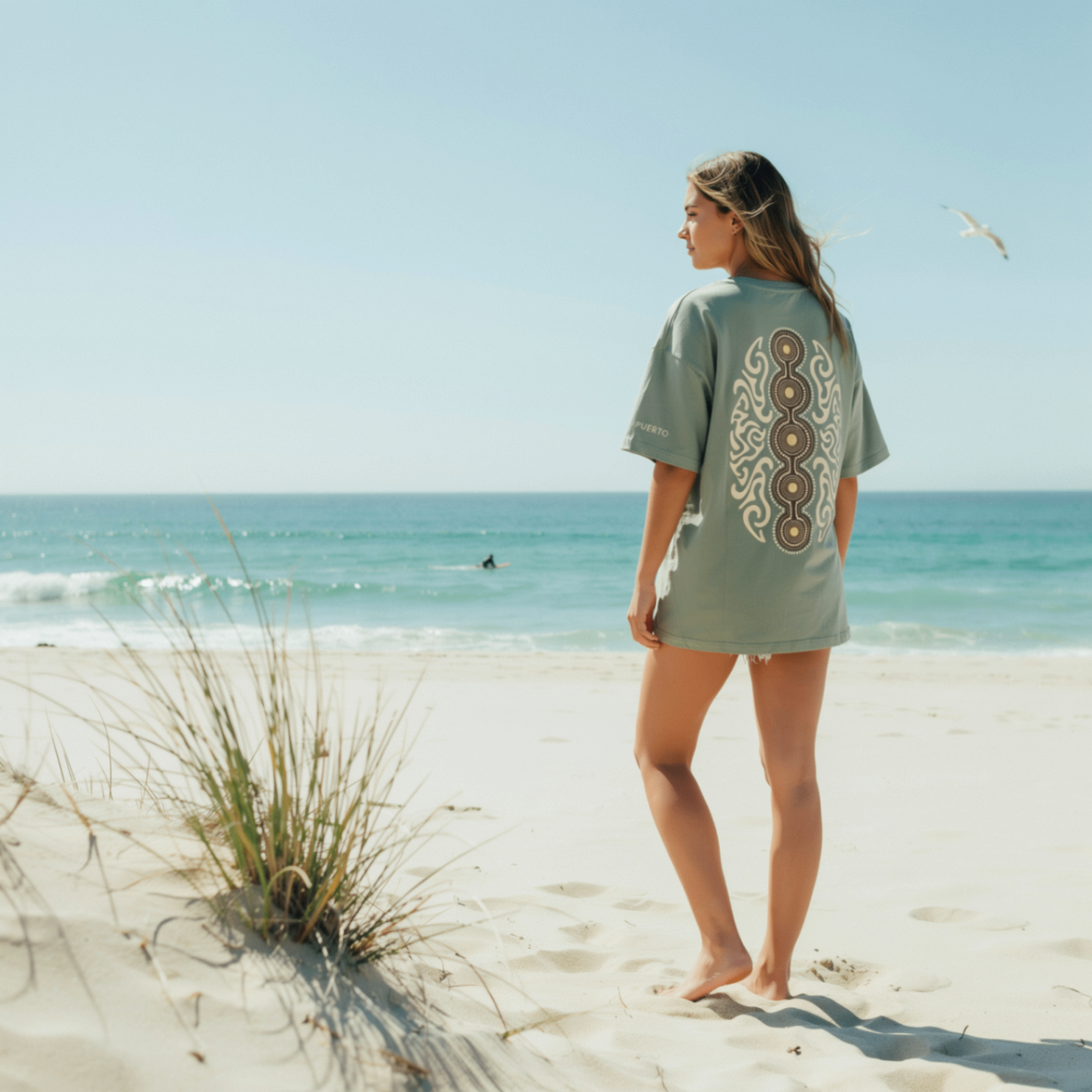 Tribal sage tee on beach