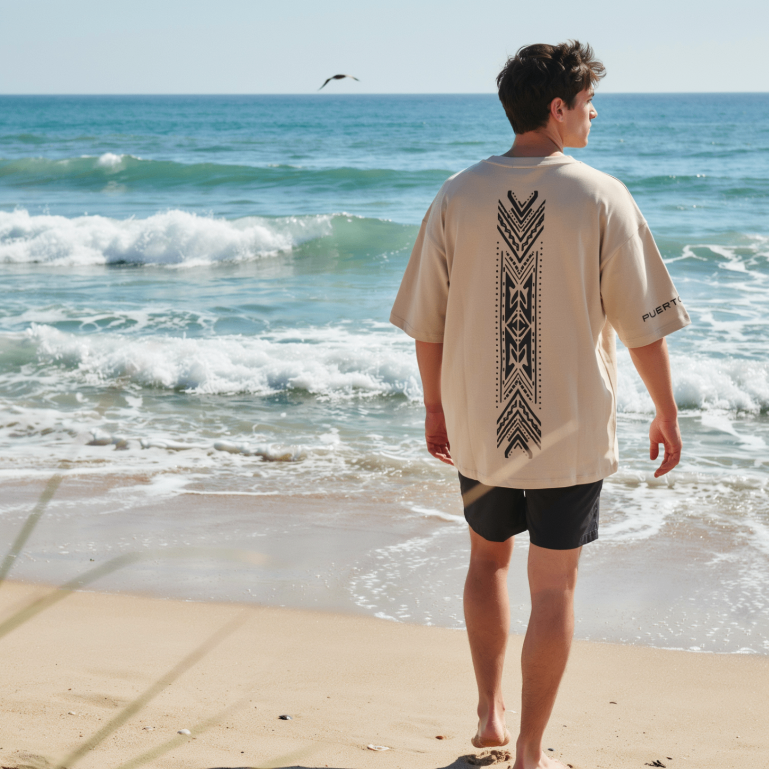 Tribal vertical black motif on beach